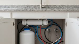 Under-sink reverse osmosis system installed for well water